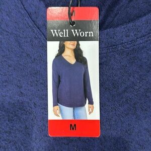 Ladies size M- brand :Well worn. Never worn with tag!